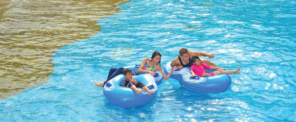 Family enjoying fun pool at Bukit Merah Lake Town Resort