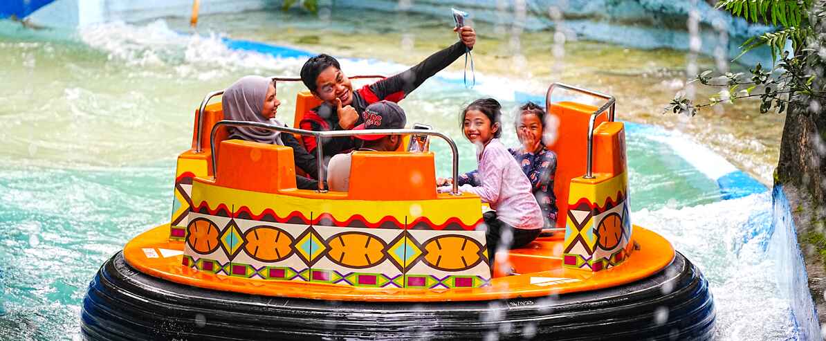 Family enjoying the water ride at Sunway Lagoon Waterpark